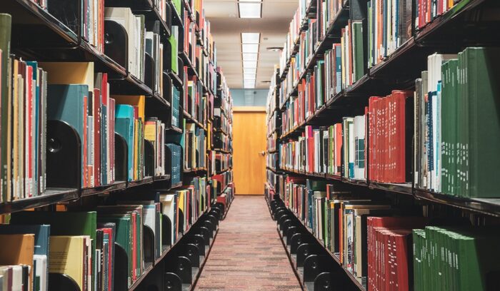 Library aisle, for article on Illinois book ban law